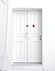 White door on a white wall