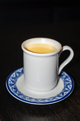 Traditional Mexican Vanilla Atole on Rustic Wooden Table