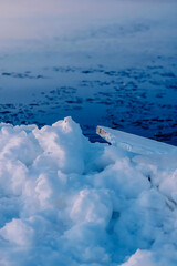 Cracked Ice in Deep Blue Ocean (Top View)