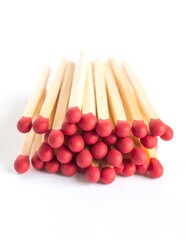 Wooden matches stacked