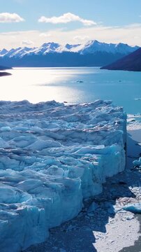 Los Glaciares National Park At El Calafate Santa Cruz Argentina. Birds Eye View Of Famous Glacier In A Patagonia Landscape. Snowing Day Tourism Expedition Snow Capped. Snowing Day Glacier.