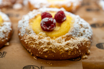 Close-up of colorful sweets and pastries served in a Warsaw cafe setting