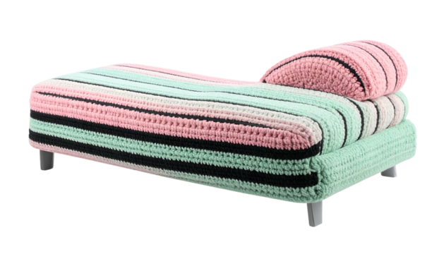 A pastel striped crochet daybed with a cylindrical headrest, on short metal legs