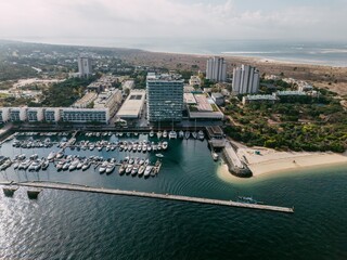 Aerial Bird's eye view of Troia Peninsula on a sunny day, near Lisbon. Sado river in the background