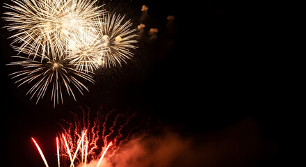 Elegant fireworks for Happy New Year dark background celebration golden or festive New Year greeting and luxury holiday background