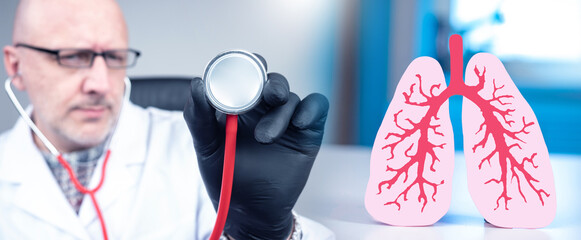 Doctor with stethoscope examining lung health, medical concept of respiratory system and...