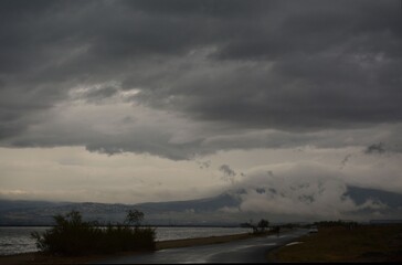 Dark grey clouds over the sea before a storm
