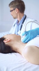 Obraz premium Doctor man wearing blue protective gloves is using ultrasound equipment on the neck of a patient woman, lying for examination. Medicine concept