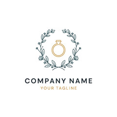 Elegant engagement ring emblem surrounded by floral wreath design for branding.