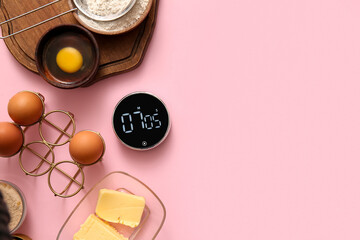 Composition with modern kitchen timer and ingredients on pink background
