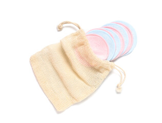 Reusable cotton pads with bag on white background