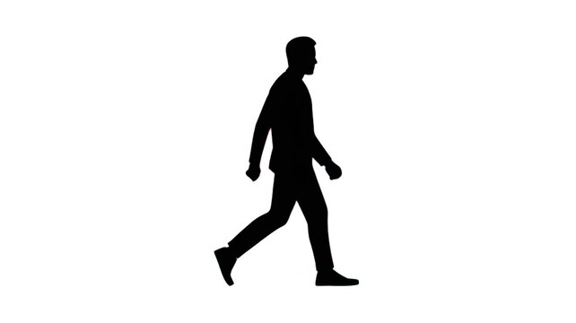 A Silhouette of a Person Walking in the Light.
