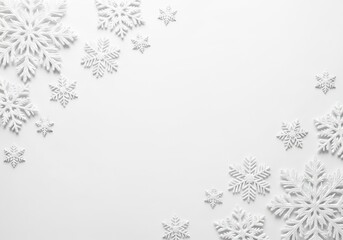 White snowflakes on a white background for winter holiday season