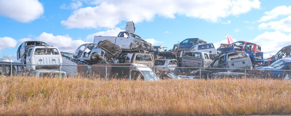 Scarped cars at a vehicle junk scrapyard
