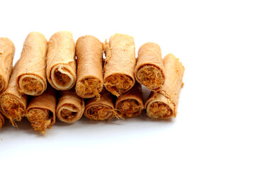 Rolled crispy wafers filled with shredded pork floss, Thai snack.