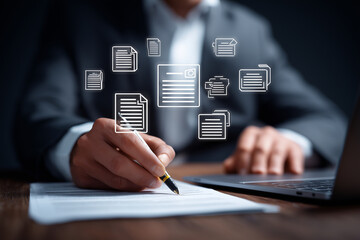 businessman is using online document management system, writing notes and organizing files. digital interface displays various document icons, enhancing productivity and efficiency