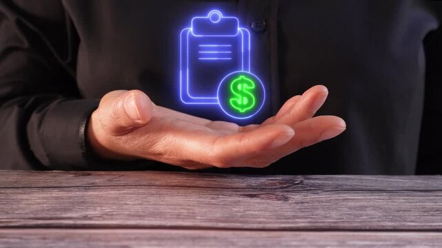 Expense and finance report. Close-up of a person's hand at a table holding a virtual icon of a clipboard with a money sign.