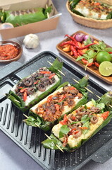 Grilled rice with its variations, wrapped in banana leaves, a traditional Indonesian food