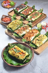 Grilled rice with its variations, wrapped in banana leaves, a traditional Indonesian food