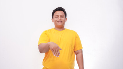 Young Asian fat men gesturing sign language on isolated background
