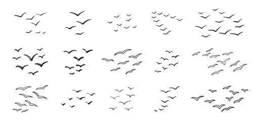 Birds flying line in the sky set. Ink grunge flock of birds afar brush hand drawn. markers and crayons © Yanka