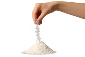Hand sprinkling flour or salt onto a pile of white powder for cooking or baking, transparent background