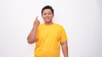 Young Asian fat men gesturing sign language on isolated background