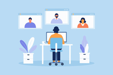 Person participating in a video conference call with colleagues from home office setting