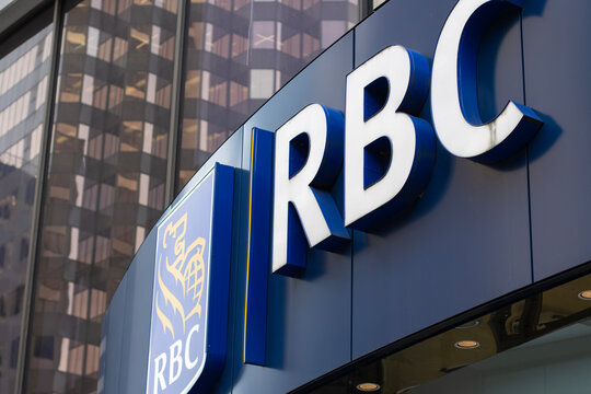 Vancouver, BC, Canada - Dec 31, 2024: RBC logo is seen at the entrance to a branch of the RBC Royal Bank at 1025 West Georgia Street in downtown Vancouver, British Columbia.