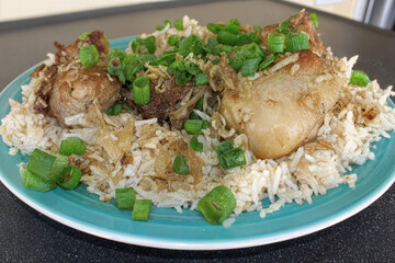 Appetizing dish of steamed rice topped with tender meat and fresh sprouts — elegant Asian cuisine.