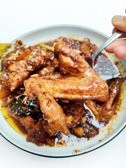 Hearty Indonesian Meal Chicken Smoor with Tender Potato Chunks and Aromatic Spices