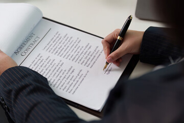 Lawyer Signing Agreement Contract