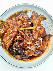 Savory Sweet Indonesian Braised Chicken Dish with Potatoes Garnished with Shallots