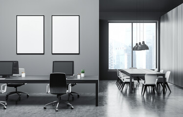 Contemporary office interior with two empty posters on wall, minimal workstations and meeting area, concrete floor and large window, 3D Rendering