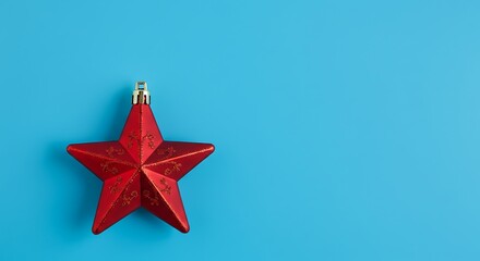 Red Star Ornament on a Bright Blue Background.
