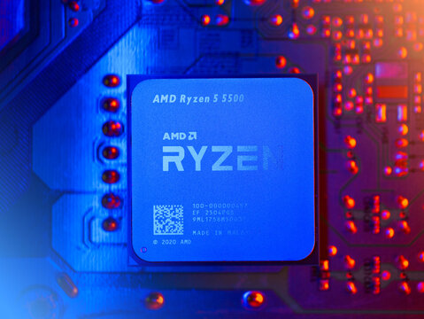 LOS ANGELES, CA - October 9, 2025: AMD Ryzen 5 5500 computer processor chip on circuit board background. Macro closeup.