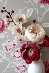 Floral wallpaper with elegant peonies and orchids in contrast