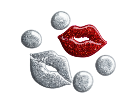 Glittery lip prints in red and silver with circular embellishments.