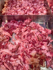 a photography of a pile of raw meat sitting on top of a counter.