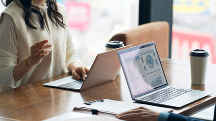 Group of casual business people meeting in an office