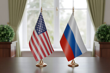 american and russian desk flags symbolizing international relations in a formal meeting