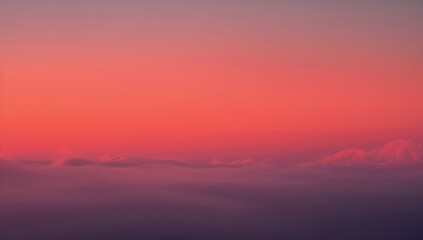 Displaying vibrant layered sky showing smooth gradient at sunrise, with low-lying cloud formations