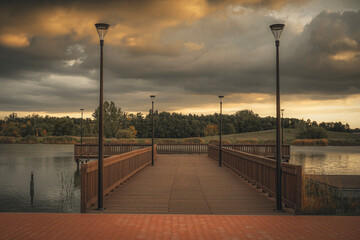 Obraz premium Sunset over the Kepina Reservoir in Zdunska Wola, Poland.