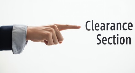 Hand pointing to the right at the words Clearance Section.