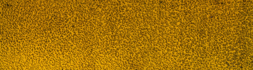 Gelbes Waschbetonmuster