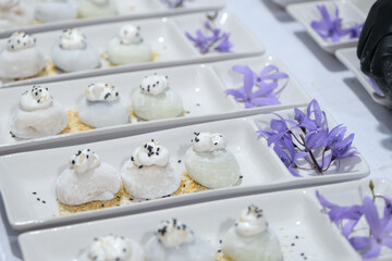 mochi sack dishes with decoration at dinner reception