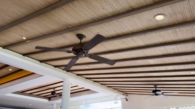 Ceiling Fans Rotating in Modern Phuket Indoor Space