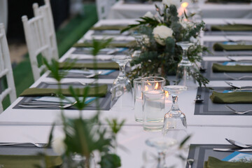 wedding reception dinner table suit at the garden in sunshine before event start