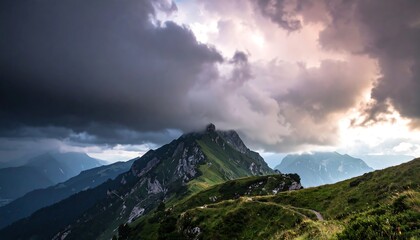 Mountain peak, dramatic clouds,  sunset