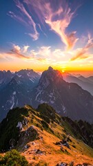 Mountain ridge at sunset, vibrant clouds